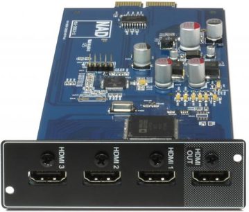 Ampli hi-fi stéréo NAD C390DD graphite, vue de dessus, circuit imprimé bleu avec composants électroniques, 4 ports HDMI