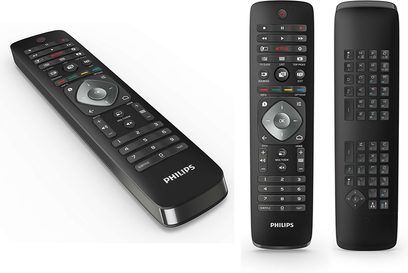 Sort Philips fjernbetjening med numerisk tastatur og knapper i flere farver, set forfra og fra siden