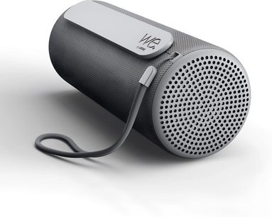 Tragbarer Bluetooth-Lautsprecher Loewe We. HEAR 1 grau, zylindrisches Format mit Trageschlaufe und perforiertem Gitter in Dreiviertelansicht