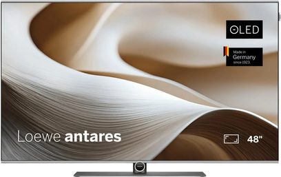 Loewe Antares 48-tommers OLED-tv, slank skærm på grå centralfod med abstrakt motiv i beige og brun