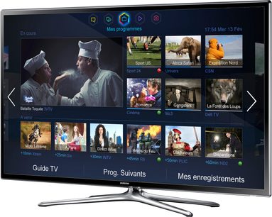 Samsung UE46F6320-fjernsyn, der viser en menu med miniaturebilleder af tv-programmer på en sort skærm, set forfra