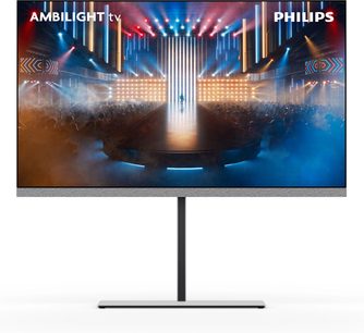 Televisore ad alta definizione Philips 65OLED959 nero con cornice metallica sottile, fascia inferiore in tessuto grigio chiaro con altoparlanti integrati e base centrale in metallo grigio, vista frontale