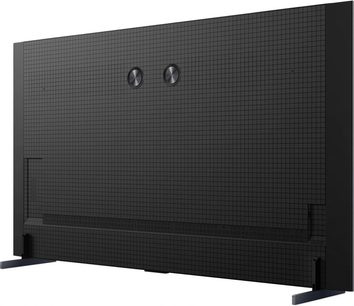 Černý televizor TCL 98C8L při pohledu zezadu, velká obrazovka s mřížkovaným vzorem a černými bočními nožičkami