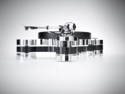 Transrotor Dark Star Silver Shadow hi-fi vinylplatespiller i svart og polert aluminium, massiv sylinderkonstruksjon med metall tonearm, lav frontvisning
