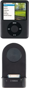 Lettore audio portatile nero Yamaha PDX-50 visto frontalmente, display LCD che mostra un menu, rotella di controllo, dock station integrata