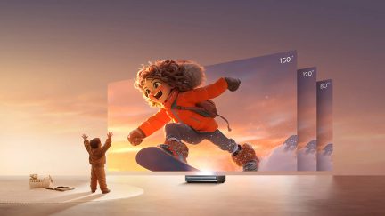 Child standing with arms raised in front of a giant screen displaying an animated character on a snowboard, projector on the floor, sizes 80", 120", 150"