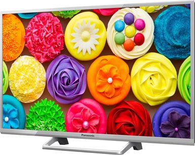 Panasonic TX-32CS600E-fladskærms-tv, der viser farverige cupcakes med lyserød, gul, orange, grøn, blå og lilla glasur