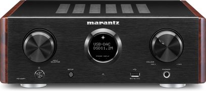 Marantz HD-AMP1 sort hi-fi stereforstærker, set forfra, børstet sort front med knapper og LCD-skærm, der viser "USB-DAC DSD11.2M"