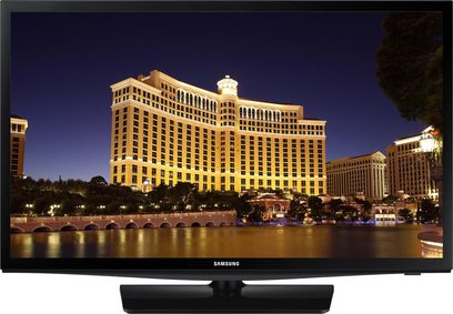 Samsung UE32H4000 32" fladskærms-TV med sort ramme, der viser natfoto af oplyst hotel ved vandet