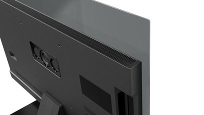 Panasonic TV-48Z90BE6 fjernsyn i mat sort plast, set bagfra i let fugleperspektiv, med en slank ramme i mørkt glas, langsgående ventilationsgitter på øverste kant og et rektangulært, forsænket modul med tre cirkler