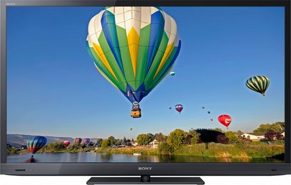 Televisore Sony KDL-55EX720 che mostra mongolfiere colorate che sorvolano un lago con alberi e case sulla riva