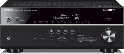 Mat sort frontpanel på Yamaha RX-V679 hjemmebiograf-forstærker, blå LCD-skærm, knapper, drejeknap, hovedtelefonstik