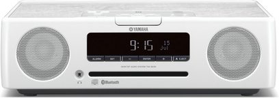 Bílý radiobudík Yamaha TSX-B235, pohled zepředu, LCD displej ukazuje 9:15, dva kruhové reproduktory, Bluetooth