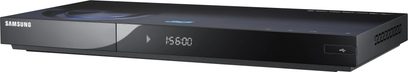 Samsung BD-C6900 sort 4K Blu-ray-afspiller, frontvisning, LED-display "15:00", blank frontpanel med knap og skuffe