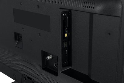 Panasonic TS-24N30AEZ, bagsidevisning, synlige stik, HDMI-porte, USB, antenne, sort tekstureret overflade, ventilationsgitre