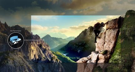 Paisaje montañoso con lago, acantilados escarpados, bosque y excursionistas en la cima de una roca que se eleva sobre el valle