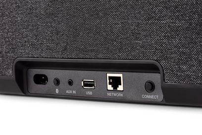 Sort Denon Home 250 trådløs højttaler set bagfra, gråt stof, strøm-, AUX-, USB- og netværksporte samt Connect-knap