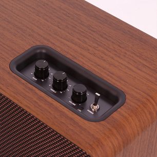 Cassa wireless Enova HIFI VELA V, vista dall'alto, 3 pulsanti neri, 1 interruttore, custodia in legno, griglia frontale