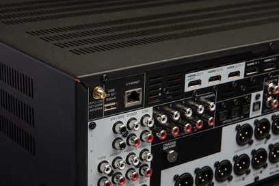 Anthem AVM 90 8K home theater preamp, rear close-up view, audio/video connectivity, HDMI ports, Ethernet, USB, wireless antenna