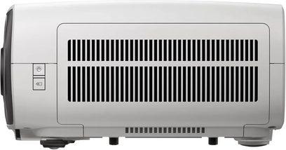 White Epson EH-LS7000 projector, side view with large black ventilation grilles and side controls