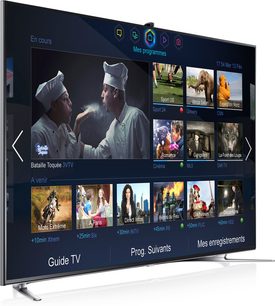 Samsung UE75F8000-fjernsyn, der viser en menu med programthumbnails, to mænd i nærbillede på hovedskærmen
