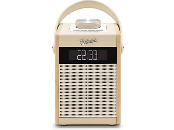 Roberts Rambler Midi Tischradio in cremefarbenem Kunststoff mit hellen Holzoptik-Seitenpaneelen, Frontansicht mit gebogener oberer Griffstange, metallischem Drehknopf oben, schwarzem Digitaldisplay und breitem horizontalem Lochblechgitter