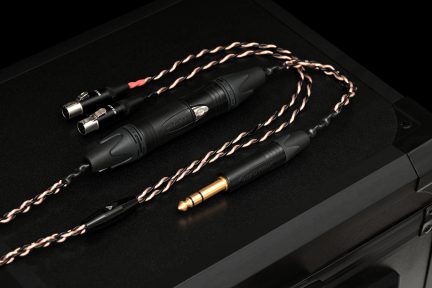 Sort og kobberfarvet flettet lydkabel med XLR-stik og forgyldt 6,35 mm jackstik