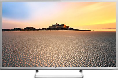 Televízor Panasonic TX-32DS600E zobrazujúci morskú krajinu pri západe slnka, stredoveký hrad na ostrove