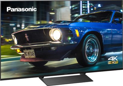 Panasonic TX-50HX800E 4K HDR-fladskærm, der viser en blå Ford Mustang fra 1969 med nummerplade "9G HF 145"