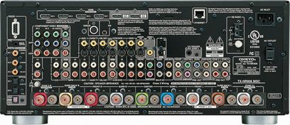 Onkyo TX-NR906 sort hjemmebiografsforstærker, set forfra, med mange stik og knapper på forsiden, digital skærm