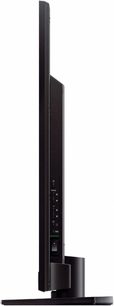 Sony KDL-55EX710 sort fladskærms-TV, venstre profilvisning, flad skærm, rektangulær base, porte og knapper på siden