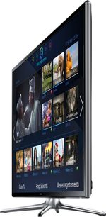 Samsung UE55F6320 fladskærms-TV, der viser TV-programminiaturer, set forfra på hvid baggrund