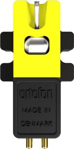 Cellule DJ Ortofon VNL DANCE noir et jaune en plastique et métal, vue de face, aiguille argentée et deux broches dorées
