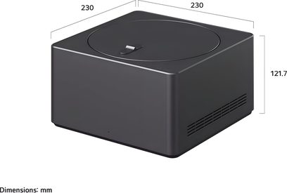 LG OLED83M5 kabinet i mat sort metal, set i trekvart foroven, kompakt kubeform med cirkulær rille og indbygget håndtag på toppen, ventilationsgitre på siderne