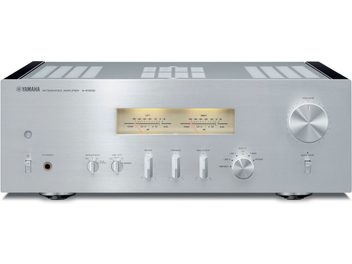 Yamaha A-S1200 gümüş hi-fi stereo amplifikatör, önden görünüm, gümüş ön panelde düğmeler, girişler ve VU metre göstergesi