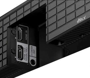 Sony Bravia Theatre Bar 9 soundbar, close-up view, HDMI IN og HDMI OUT stik synlige, sort tekstureret overflade