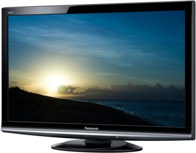 Panasonic TX-L37G15 fladskærm slukket, set forfra, placeret på et stativ, viser et maritimt landskab ved solnedgang
