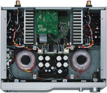Open Pioneer A-A9-J stereo hi-fi amplifier, front view, green printed circuit boards, electronic components, copper toroidal transformers