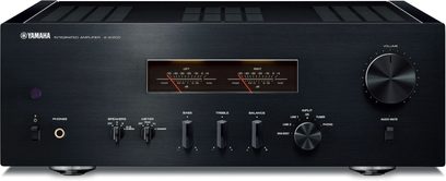 Black front panel of Yamaha A-S1200 stereo hi-fi amplifier with orange VU meters, silver knobs and connectors
