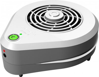 Furutech DESTAT II-enhed i grå og hvid, set ovenfra, rund sort gitter, grøn knap, cylindrisk form