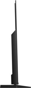Panasonic TX-65JX940E-fladskærms-tv, set fra siden, lodret, rektangulært sort fladskærms-panel på rektangulært sort fod