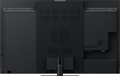Televizor Panasonic TV-55Z95AEG s vysokým rozlišením, zadní pohled, centrální pruhovaný panel, konektory v pravém dolním rohu
