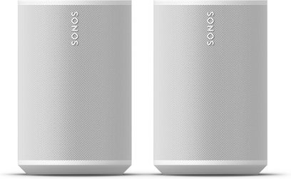 Hvidt par trådløse Sonos Era 100 SL‑højttalere, set forfra med stor perforeret metalfrontgrill
