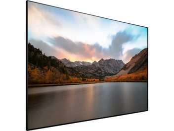 Rectangular flat screen displaying an autumnal mountainous landscape by a lake, under a cloudy sunset sky