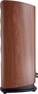 Altavoz de columna Canton Reference 7 acabado en nogal, vista de perfil, recinto de madera curvada sobre base negra