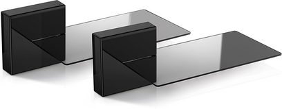 Tre Meliconi Ghost Cubes Soundbar kabelgennemføringer i skinnende sort, forskellige størrelser, på hvid baggrund