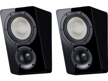 Par med Dolby Atmos-høyttalere Canton AR 5 i sort pianolakk, skrå front med lyst basselement og svart diskant