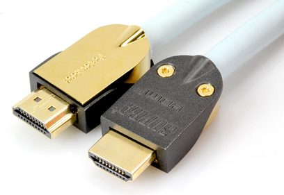 Forgyldte HDMI-adaptere fra Supra med hanstik, set forfra og fra siden, på hvid baggrund