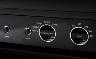 Rega Aura MC black phono preamp, close-up front view of the gain, capacitance and load controls, and rotary selectors