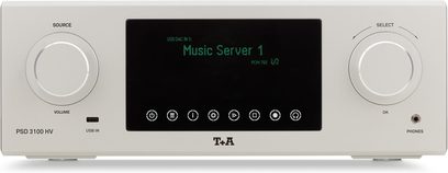 Gümüş renkli T+A PSD 3100 HV stereo ön amplifikatör, önden görünüm, ortada siyah ekran ve iki büyük kontrol düğmesiyle
